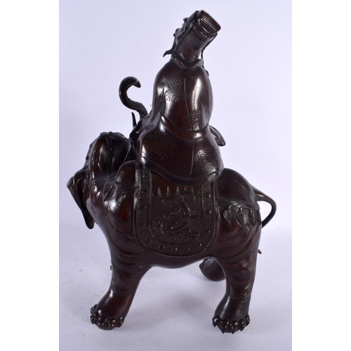 1599 - A LARGE 19TH CENTURY JAPANESE MEIJI PERIOD BRONZE OKIMONO modelled as a male upon an elephant. 37 cm... 