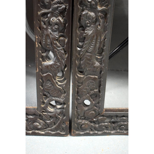 1609 - A LARGE PAIR OF 19TH CENTURY CHINESE CARVED WOOD DRAGON FRAMES Qing. 117 cm x 70 cm.