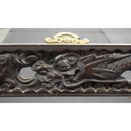 1609 - A LARGE PAIR OF 19TH CENTURY CHINESE CARVED WOOD DRAGON FRAMES Qing. 117 cm x 70 cm.