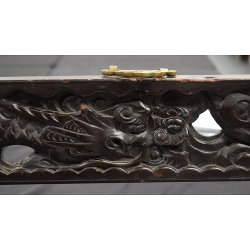 1609 - A LARGE PAIR OF 19TH CENTURY CHINESE CARVED WOOD DRAGON FRAMES Qing. 117 cm x 70 cm.