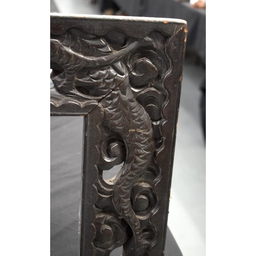 1609 - A LARGE PAIR OF 19TH CENTURY CHINESE CARVED WOOD DRAGON FRAMES Qing. 117 cm x 70 cm.