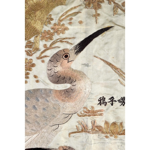 1615 - A LARGE 19TH CENTURY JAPANESE MEIJI PERIOD FRAMED SILK WORK PANEL depicting birds. 130 cm x 54 cm.