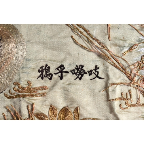 1615 - A LARGE 19TH CENTURY JAPANESE MEIJI PERIOD FRAMED SILK WORK PANEL depicting birds. 130 cm x 54 cm.