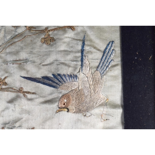 1615 - A LARGE 19TH CENTURY JAPANESE MEIJI PERIOD FRAMED SILK WORK PANEL depicting birds. 130 cm x 54 cm.