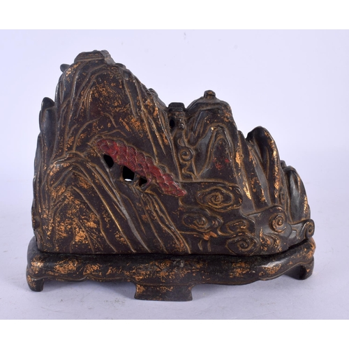 1630 - AN UNUSUAL CHINESE LACQUERED BRONZE MOUNTAIN AND COVER 20th Century. 16 cm x 14 cm