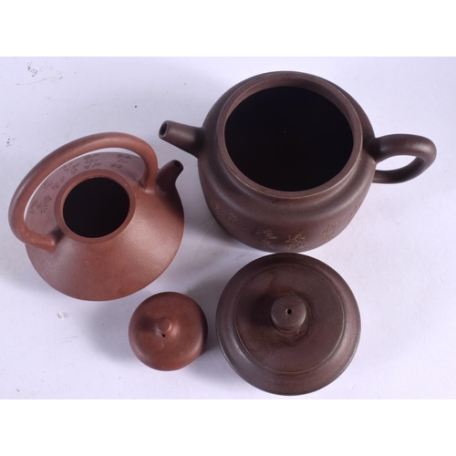 1631 - TWO CHINESE YIXING POTTERY TEAPOTS AND COVER 20th Century. Largest 14 cm wide. (2)