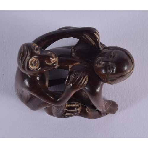 1649 - A JAPANESE CARVED BOXWOOD EROTIC NETSUKE. 5 cm x 5.5 cm.