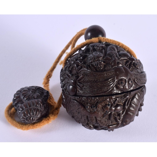 1650 - A JAPANESE CARVED BOXWOOD INRO with attached netsuke. Inro 7 cm wide.