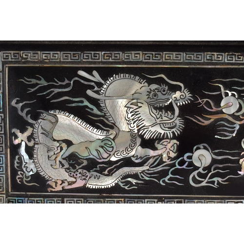 1673 - AN EARLY 20TH CENTURY JAPANESE KOREAN MOTHER OF PEARL INLAID PANEL depicting dragons. 36 cm x 24 cm.