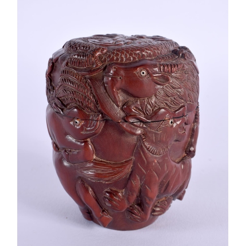 1697 - A JAPANESE CARVED WOOD BOX AND COVER. 8 cm x 6 cm.