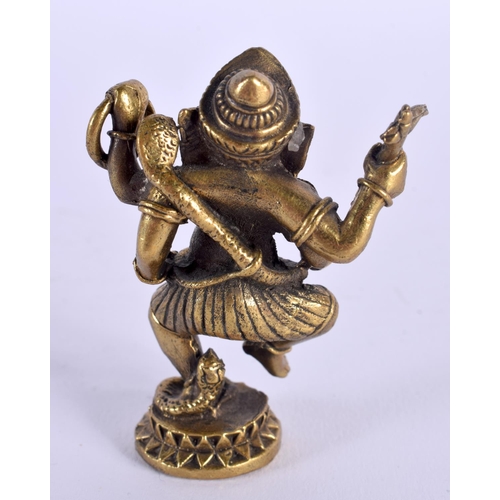 1700 - A 19TH CENTURY MIDDLE EASTERN INDIAN BRONZE FIGURE OF GANESHA modelled with arms raised. 6 cm x 4.25... 