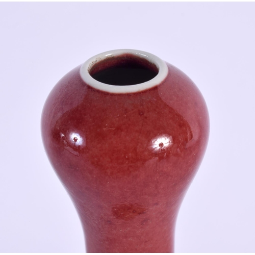 1703 - A CHINESE GARLIC NECK RED PORCELAIN VASE 20th Century. 18 cm high.