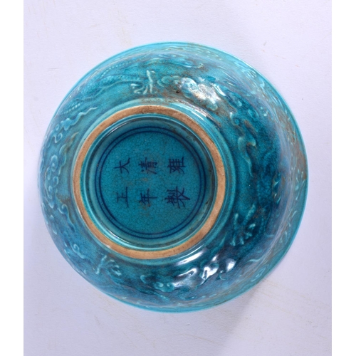 1715 - A CHINESE MONOCHROME BLUE GLAZED PORCELAIN BOWL 20th Century. 14 cm diameter.