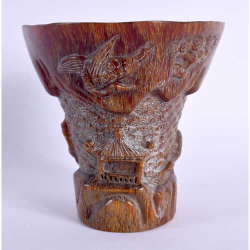 1719 - A CHINESE CARVED BUFFALO HORN TYPE LIBATION CUP 20th Century. 418 grams. 11 cm x 11 cm.