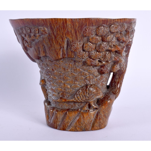 1719 - A CHINESE CARVED BUFFALO HORN TYPE LIBATION CUP 20th Century. 418 grams. 11 cm x 11 cm.