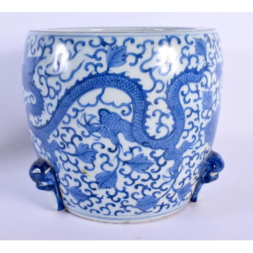 1722 - A CHINESE BLUE AND WHITE PORCELAIN JARDINIERE 20th Century, painted with dragons. 18 cm x 18 cm.