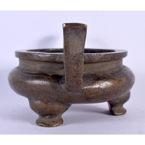 1731 - A CHINESE TWIN HANDLED BRONZE CENSER 20th Century. 17 cm wide, internal width 8.5 cm.