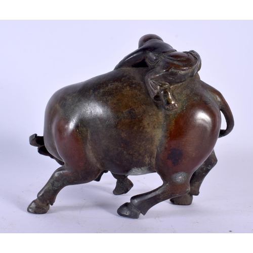 1732 - A CHINESE BRONZE FIGURE OF A BULLOCK 20th Century. 15 cm x 13 cm.