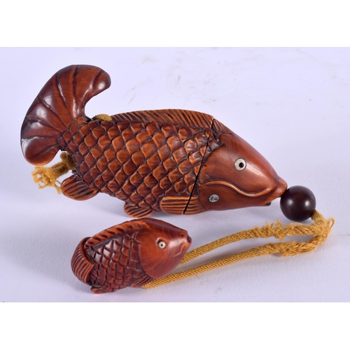 1743 - A JAPANESE CARVED BOXWOOD FISH INRO with netsuke. Inro 11.5 cm x 5.75 cm.