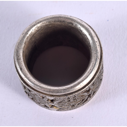 1767 - A CHINESE WHITE METAL ARCHERS RING 20th Century. 36 grams. 3 cm wide.