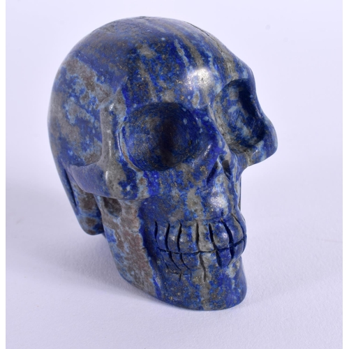 1780 - A CHINESE CARVED LAPIS LAZULI SKULL 20th Century. 5.5 cm x 6 cm.