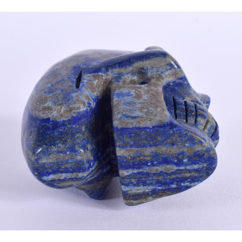 1780 - A CHINESE CARVED LAPIS LAZULI SKULL 20th Century. 5.5 cm x 6 cm.