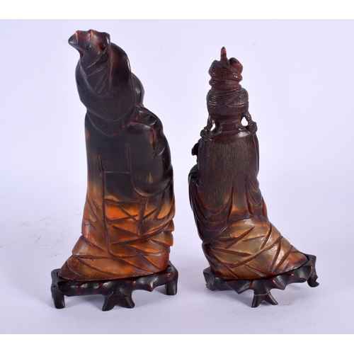 1794 - A PAIR OF 19TH CENTURY CHINESE CARVED BUFFALO HORN FIGURES Qing. Largest 18 cm high.