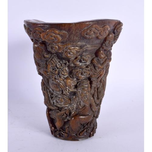 1800 - A CHINESE CARVED BUFFALO HORN TYPE LIBATION CUP 20th Century. 873 grams. 14 cm x 11 cm.