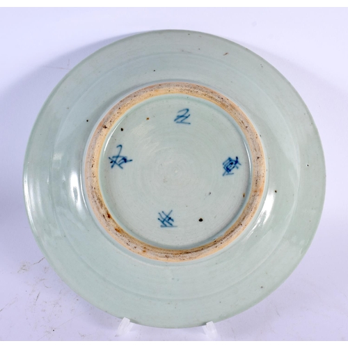 1810 - A 19TH CENTURY CHINESE BLUE AND WHITE CELADON PLATE Qing. 23.5 cm diameter.