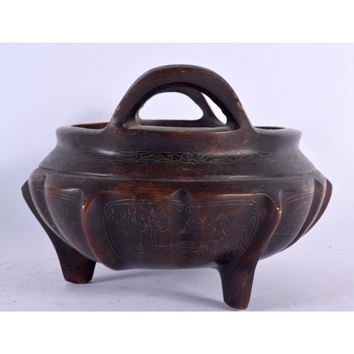 1811 - A CHINESE TWIN HANDLED BRONZE CENSER 20th Century. 15 cm wide, internal width 10 cm.