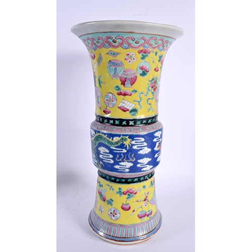 1815 - A 19TH CENTURY CHINESE FAMILLE JAUNE PORCELAIN GU FORM BEAKER VASE Qing. 36 cm x 15 cm.