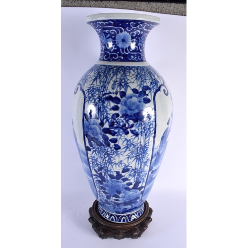 1817 - A LARGE 19TH CENTURY JAPANESE MEIJI PERIOD BLUE AND WHITE VASE upon an antique Chinese stand. 65 cm ... 