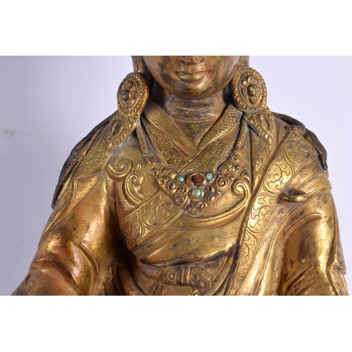 1830 - A LARGE 19TH CENTURY CHINESE TIBETAN BRONZE FIGURE OF A BUDDHA modelled holding a stupa. 38 cm x 15 ... 