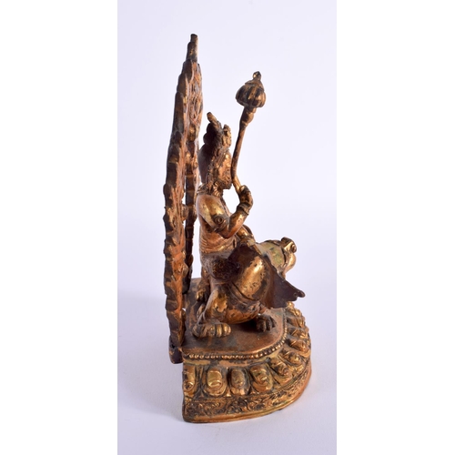 1831 - A 19TH CENTURY CHINESE TIBETAN GILT BRONZE FIGURE OF A BUDDHA modelled riding upon a beast. 19 cm x ... 