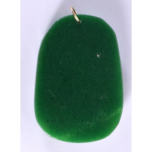 1889 - A CHINESE CARVED GREEN JADE GOLD MOUNTED PENDANT 20th Century. 6.5 cm x 4.25 cm.