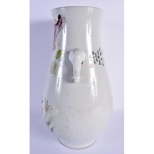 1906 - A LARGE CHINESE REPUBLICAN PERIOD TWIN HANDLED FAMILLE ROSE VASE painted with insects and flowers. 3... 