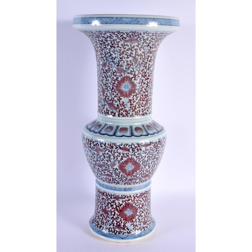 1912 - A LARGE 19TH CENTURY CHINESE IRON RED BLUE AND WHITE GU FORM BEAKER VASE Qing. 46 cm x 18 cm.