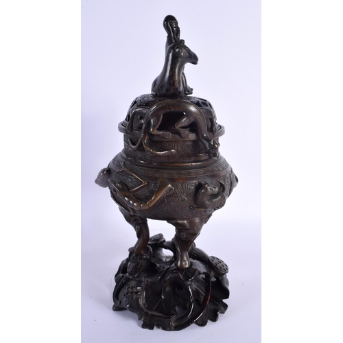 1922 - A LARGE 18TH/19TH CENTURY CHINESE TWIN HANDLED BRONZE CENSER AND COVER Ming style, overlaid with shr... 