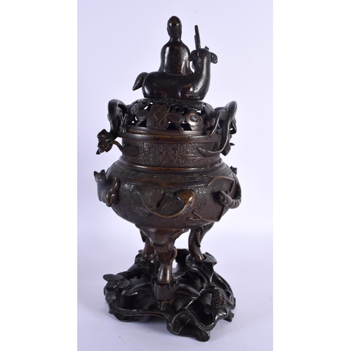 1922 - A LARGE 18TH/19TH CENTURY CHINESE TWIN HANDLED BRONZE CENSER AND COVER Ming style, overlaid with shr... 