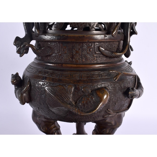 1922 - A LARGE 18TH/19TH CENTURY CHINESE TWIN HANDLED BRONZE CENSER AND COVER Ming style, overlaid with shr... 