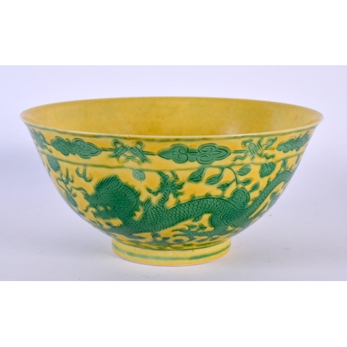 1930 - A CHINESE YELLOW GLAZED CIRCULAR PORCELAIN BOWL 20th Century, bearing Qianlong marks to base. 15 cm ... 