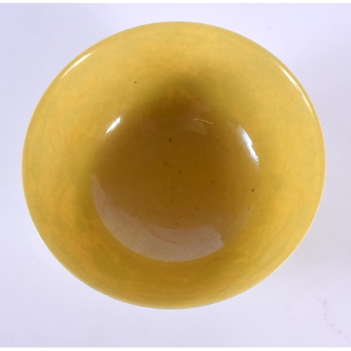 1930 - A CHINESE YELLOW GLAZED CIRCULAR PORCELAIN BOWL 20th Century, bearing Qianlong marks to base. 15 cm ... 