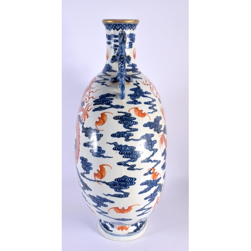 1931 - A LARGE CHINESE TWIN HANDLED IRON RED BLUE AND WHITE PORCELAIN FLASK 20th Century. 50 cm x 22 cm.