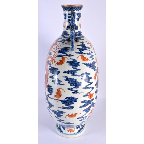 1931 - A LARGE CHINESE TWIN HANDLED IRON RED BLUE AND WHITE PORCELAIN FLASK 20th Century. 50 cm x 22 cm.