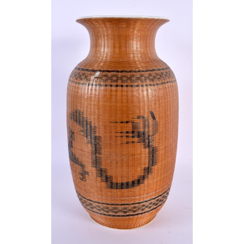 1937 - A CHINESE REPUBLICAN PERIOD WICKER OVERLAID PORCELAIN VASE. 24 cm high.