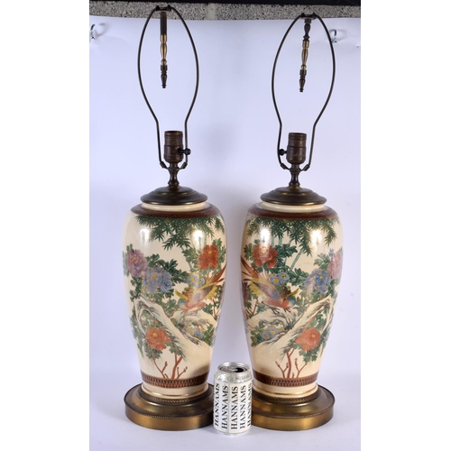 1945 - A LARGE PAIR OF EARLY 20TH CENTURY JAPANESE MEIJI PERIOD SATSUMA LAMPS painted with birds and landsc... 