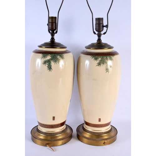 1945 - A LARGE PAIR OF EARLY 20TH CENTURY JAPANESE MEIJI PERIOD SATSUMA LAMPS painted with birds and landsc... 