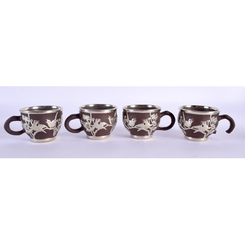 1948 - AN UNUSUAL EARLY 20TH CENTURY CHINESE METAL OVERLAID YIXING POTTERY TEASET Late Qing/Republic. Large... 