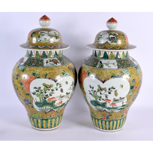 1949 - A LARGE PAIR OF CHINESE FAMILLE JAUNE VERTE PORCELAIN VASES AND COVERS 20th Century. 44 cm x 16 cm.