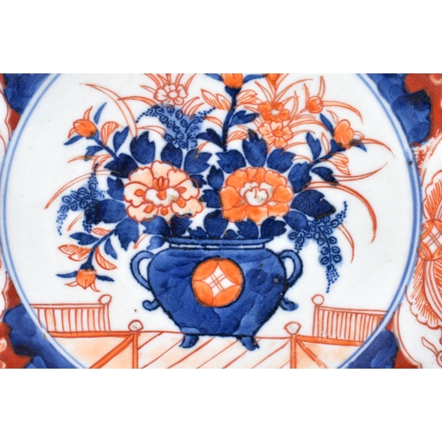 1957 - A LARGE 19TH CENTURY JAPANESE MEIJI PERIOD IMARI DISH painted with beasts and flowers. 27 cm wide.